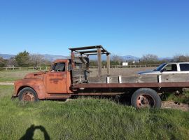 1948 GMC 5 window flatbed dump truck