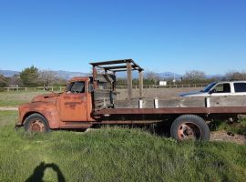 1948 GMC 5 window flatbed dump truck