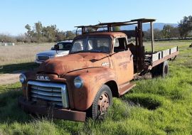 1948 GMC 5 window flatbed dump truck